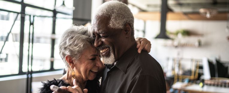 senior-couple-dancing-indoors