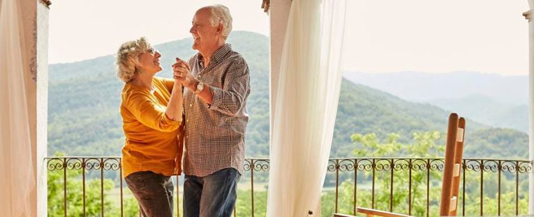 senior-couple-dancing-outdoors
