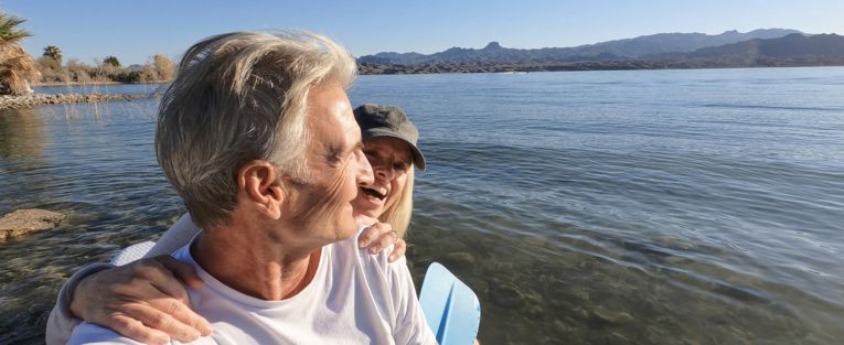 senior-couple-paddling-on-lake