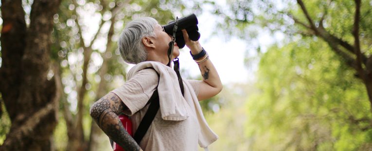 senior-woman-bird-watching