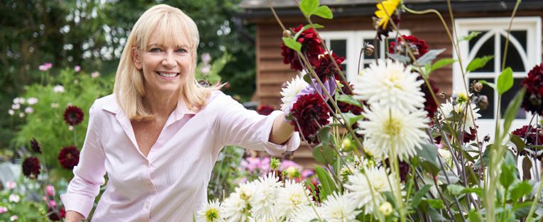 senior-woman-in-flower-garden